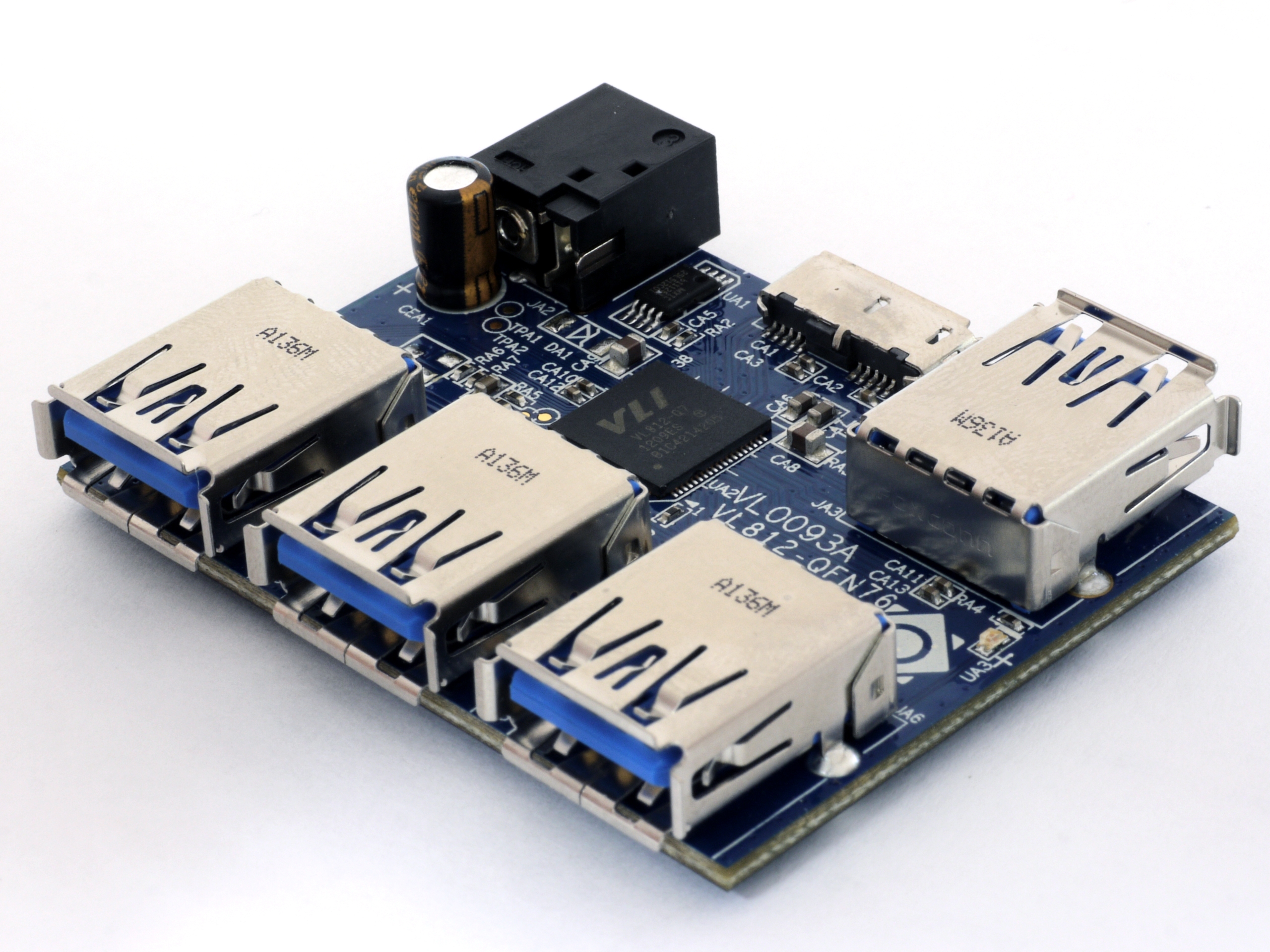 A small USB hub PCB built around a single-chip controller (VIA Labs VL812 in this example — same architecture class as the GL850G recommended below: USB hub controller, a few passives, no external …