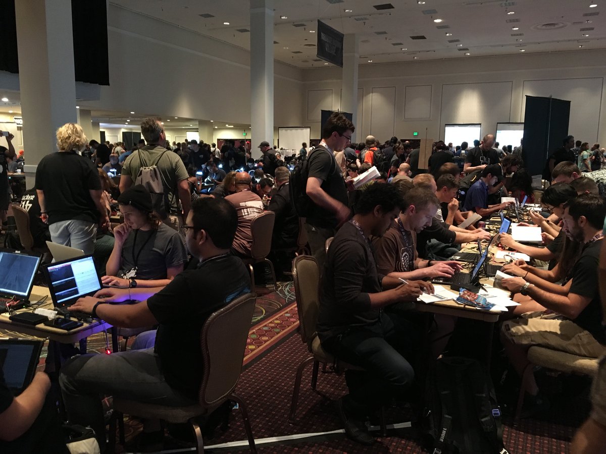 Figure 1.1 — DEF CON, the canonical hacker conference, established 1993 by Jeff Moss. The contest area on the floor is where much of the public-facing hacker community renews itself each summer. Ph…