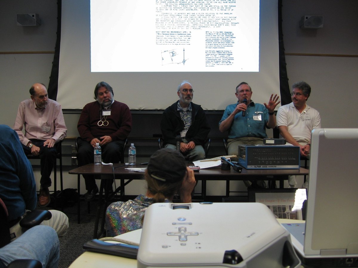 A 30th-anniversary Homebrew Computer Club retrospective gathering in 2005. From left to right: Michael Holley, Steve Wozniak, Allen Baum, Lee Felsenstein, and Bob Lash — central figures of the 1975…