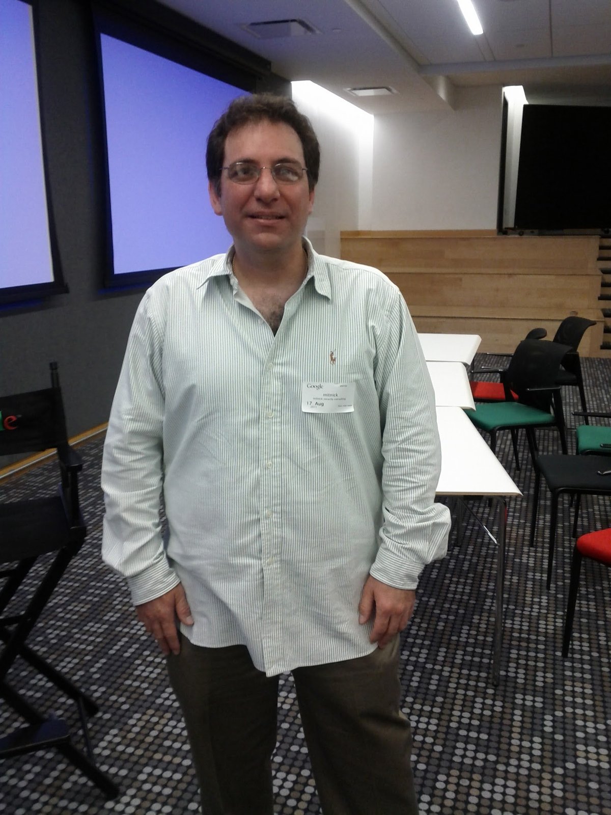 Kevin Mitnick at Google, mid-2010s, after a book talk for Ghost in the Wires. Post-prison Mitnick built a successful security-consulting practice (Mitnick Security Consulting) and the consultancy K…