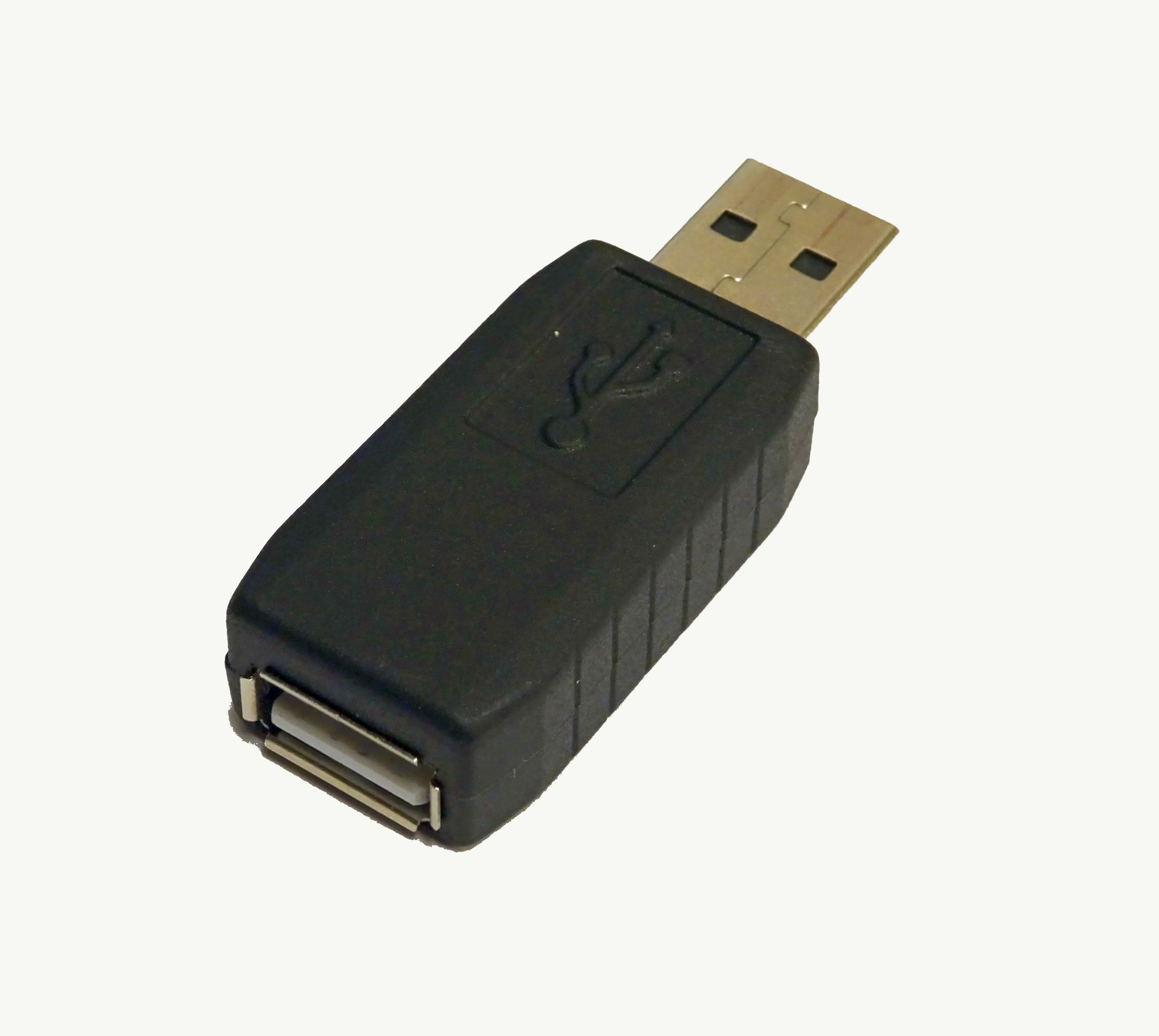 A typical inline USB hardware keylogger — the canonical reference form factor for the hardware-keylogger category. The device is a small cylinder (~2 cm) that sits between the keyboard's USB cable …