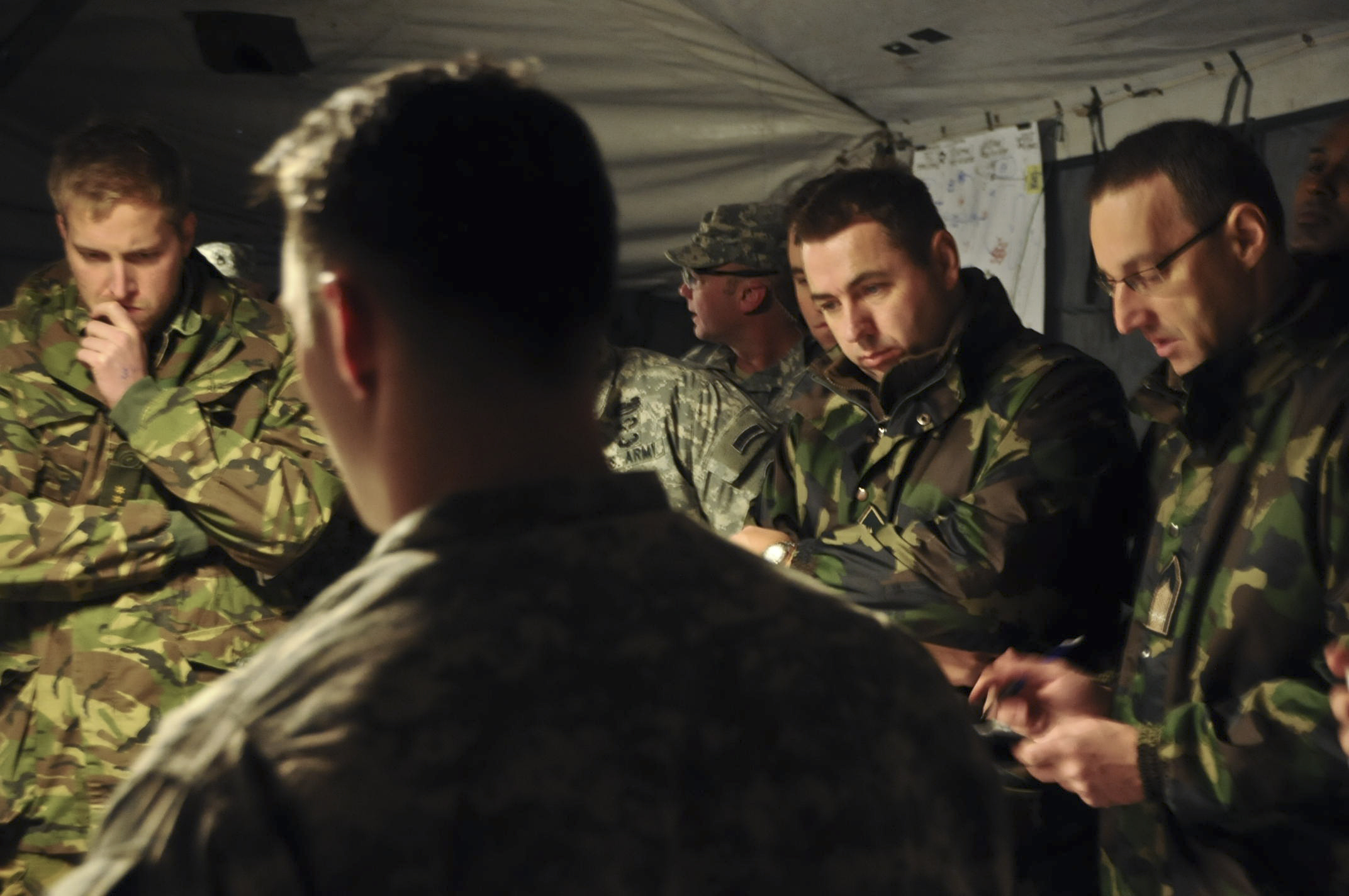 U.S. Army leaders briefing during the Allied Spirit I multinational war-gaming exercise at the Joint Multinational Readiness Center, Hohenfels, Germany, January 2015. The war-gaming format — advers…