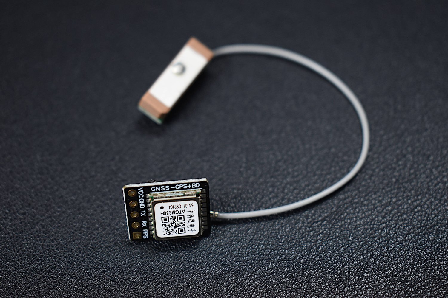 Figure 2 — A representative ATGM336H GPS module with ceramic patch antenna, the GPS the kits ship. HaleHound also accepts GT-U7 and NEO-6M. Photo: HaleHound.com (representative component).