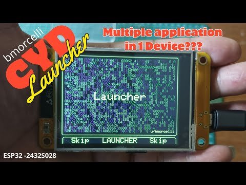 M5Launcher running on Cardputer-class hardware — the menu-driven launcher that boots from app0, manages the OTA slot, and exposes the partition/filesystem tools covered in § 3.2.