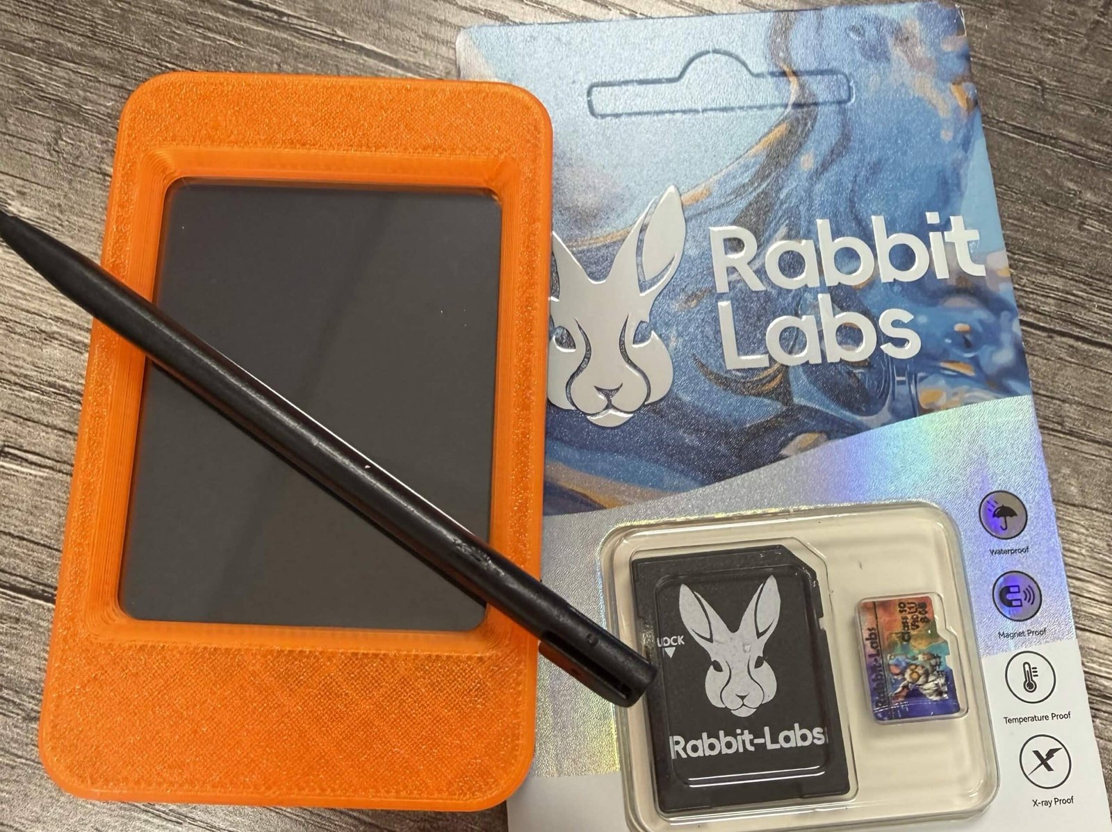 Figure 7 — The Phantom kit: the cased board, stylus and a Rabbit Labs microSD card. Image: Rabbit Labs, The Phantom product page.