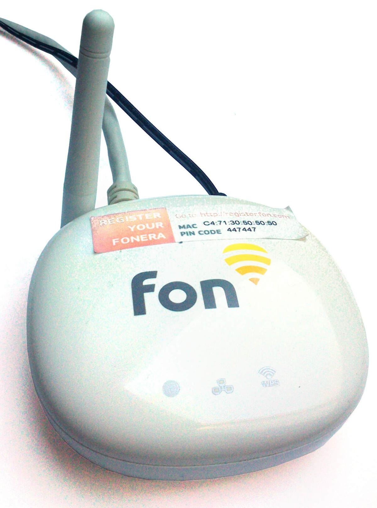Figure 2.1 — A Fon/Fonera access point. The first WiFi Pineapple (2008) was a Fon/Fonera AP with KARMA patches applied to its hostapd, housed in a novelty pineapple cocktail cup — this consumer rou…
